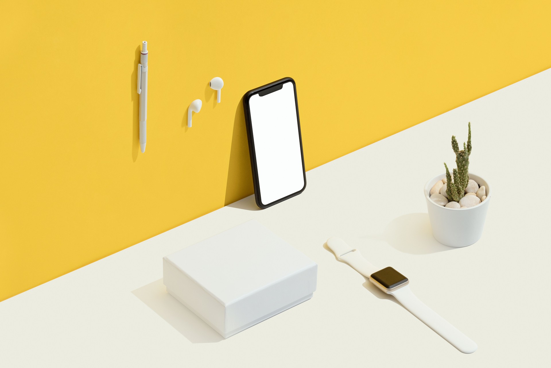 Personal accessories flat lay on yellow and white background